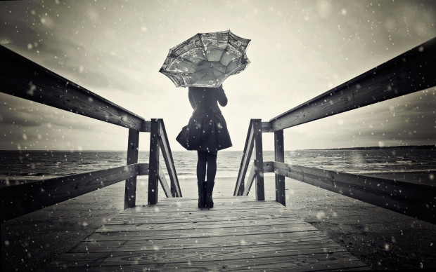 Sad girl holding umbrella (Image source: http://www.hercampus.com/school/maryland/5-ways-avoid-winter-sadness)